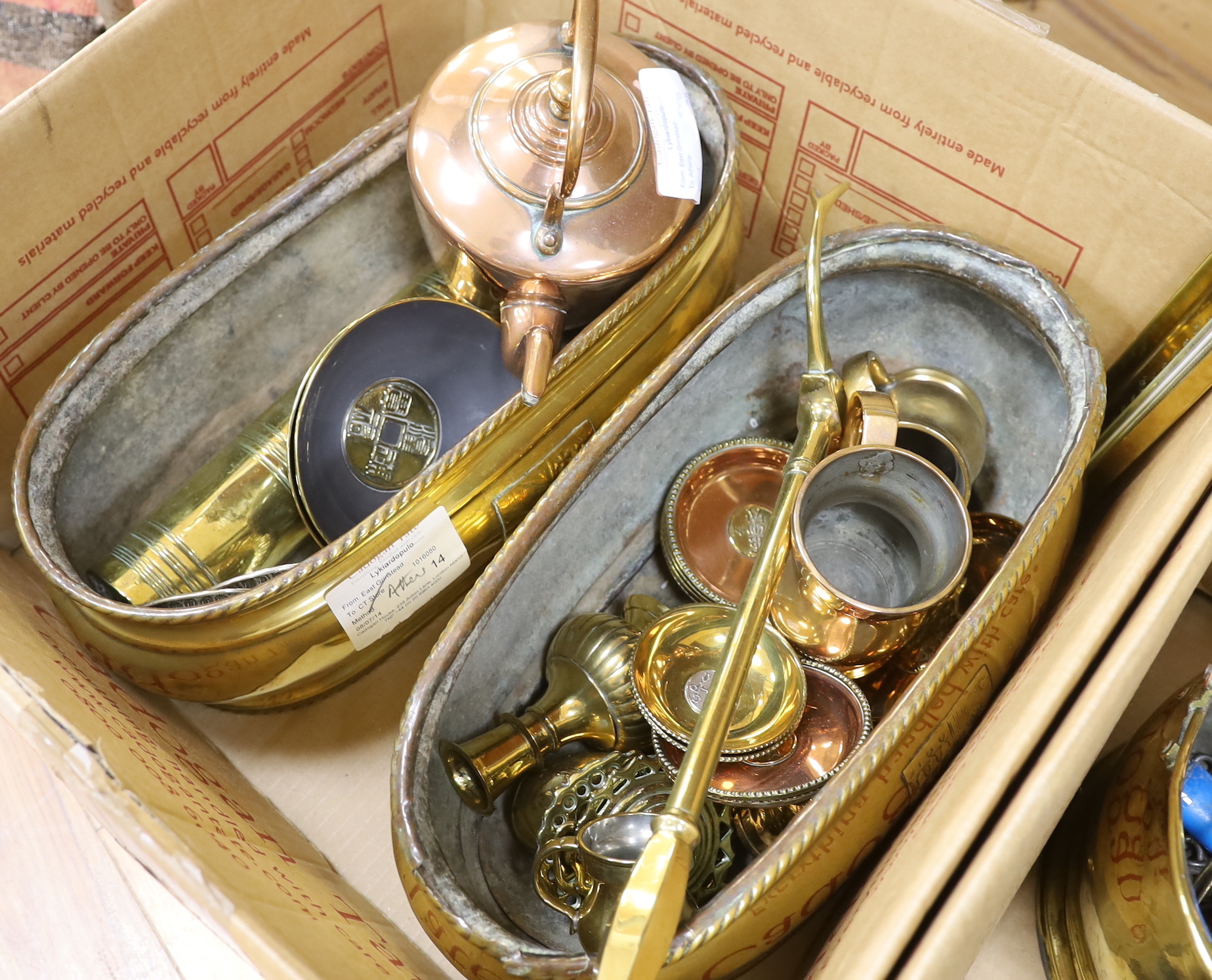 A collection of metalware including a pair of brass planters, a copper kettle